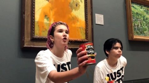 Just Stop Oil activists in the gallery in London after throwing soup on the painting.