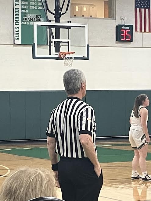 Referees at Suttons girls basketball playoff game against Springfield Renaissance.
