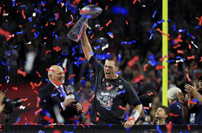 Brady collecting his sixth Superbowl ring, in 2017, with the Patriots. 