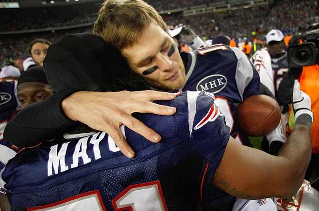 A throwback of Tom and Mayo after a game in 2010. (LAPESSE)