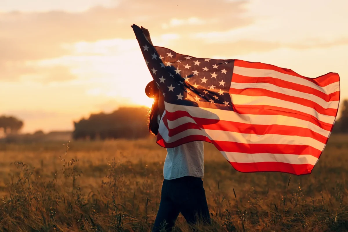 U.S.A. Flag waving during the sunset.
(Allegiance Flag Supply)