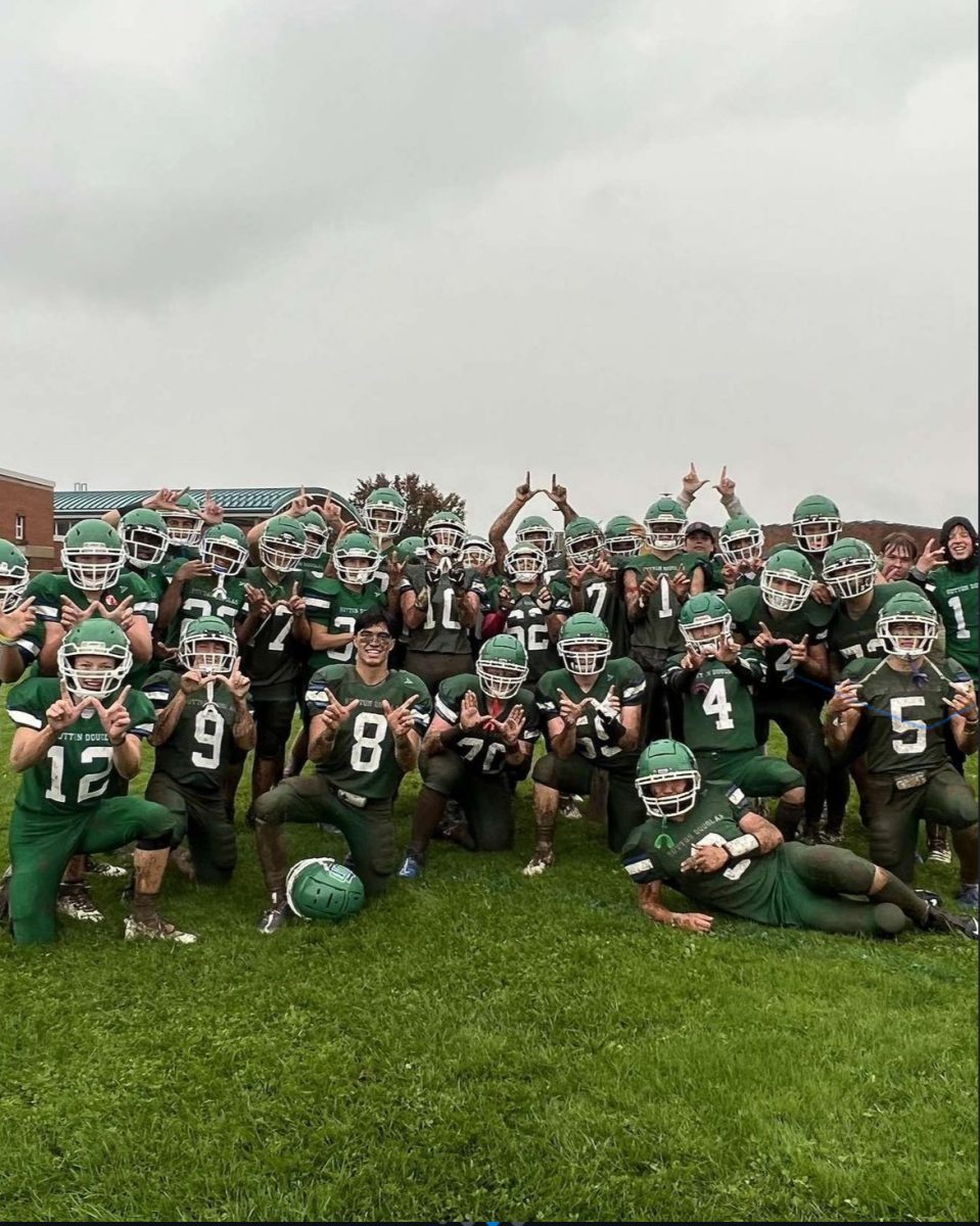 Here Sutton's football team poses for a team photo.