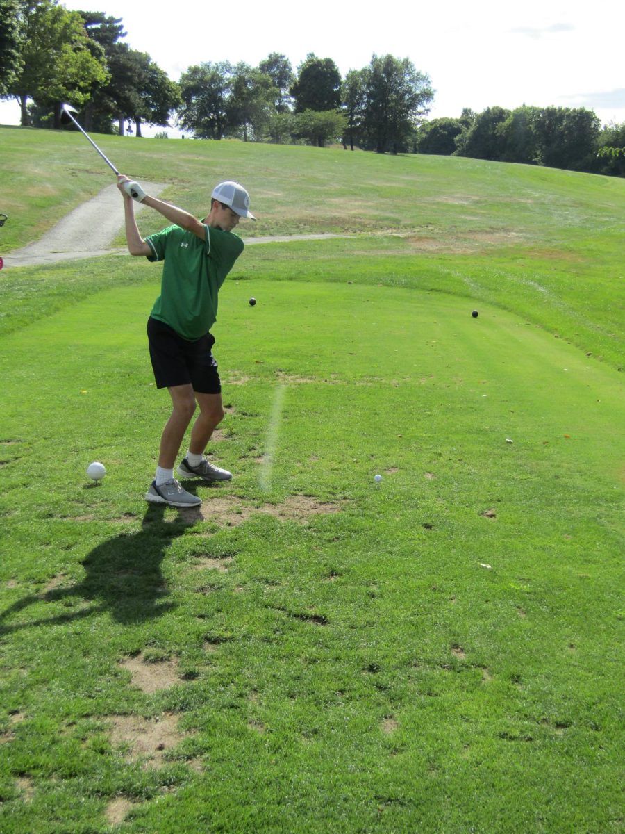 Here one of Sutton's golfers winds up for a big swing.