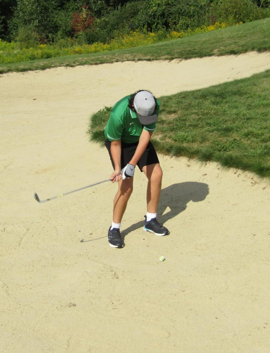 Troy Georgiopoulos looks to get out of the bunker in a recent match