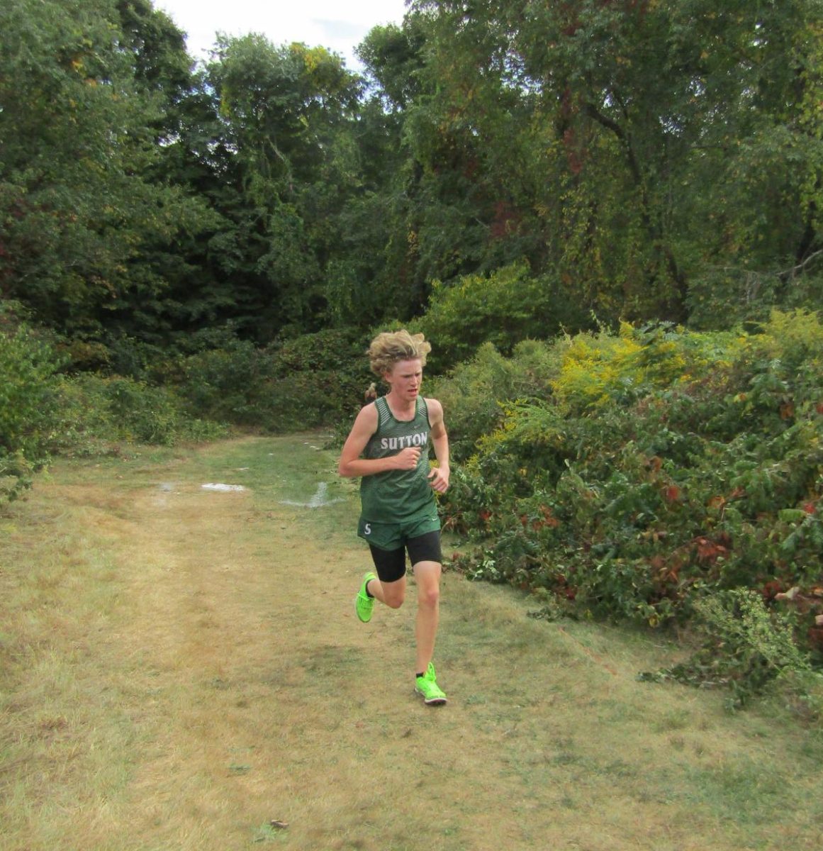 Amsden Klinghard leads the way for the Sutton Cross Country team yesterday at Shaw Farm. 