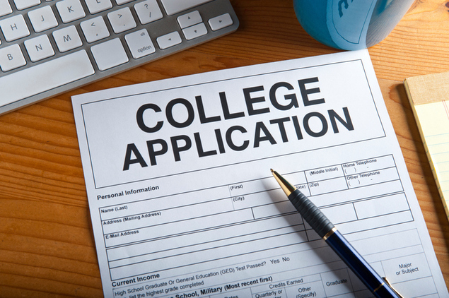 Photo of a blank College Application on top of a desk.