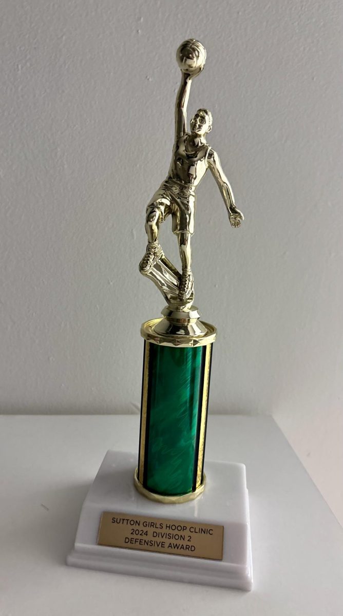 Basketball trophy awarded for a clinic given for defensive work.