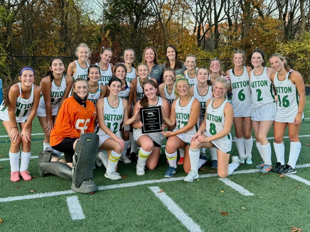 The Suzies pose with their award after their win against Hopedale in the CMASS finals.