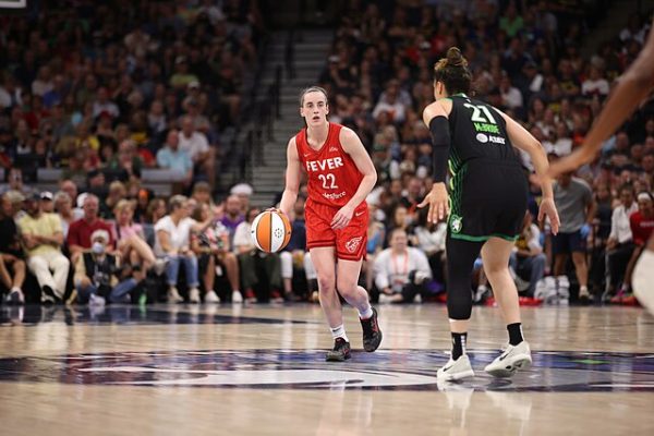 In her first year, Caitlyn Clark helped boost attendance in the WNBA. (Johnmac--Public Domain--https://en.m.wikipedia.org/wiki/File:Caitlin_Clark_Fever.jpg)