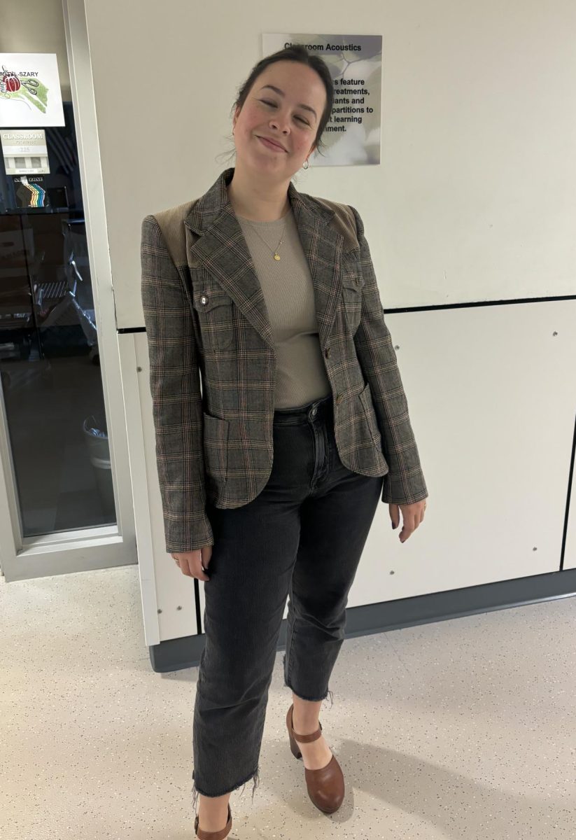 Sutton High's very own Ms. Taylor wearing her thrifted jacket. Very Stylish!