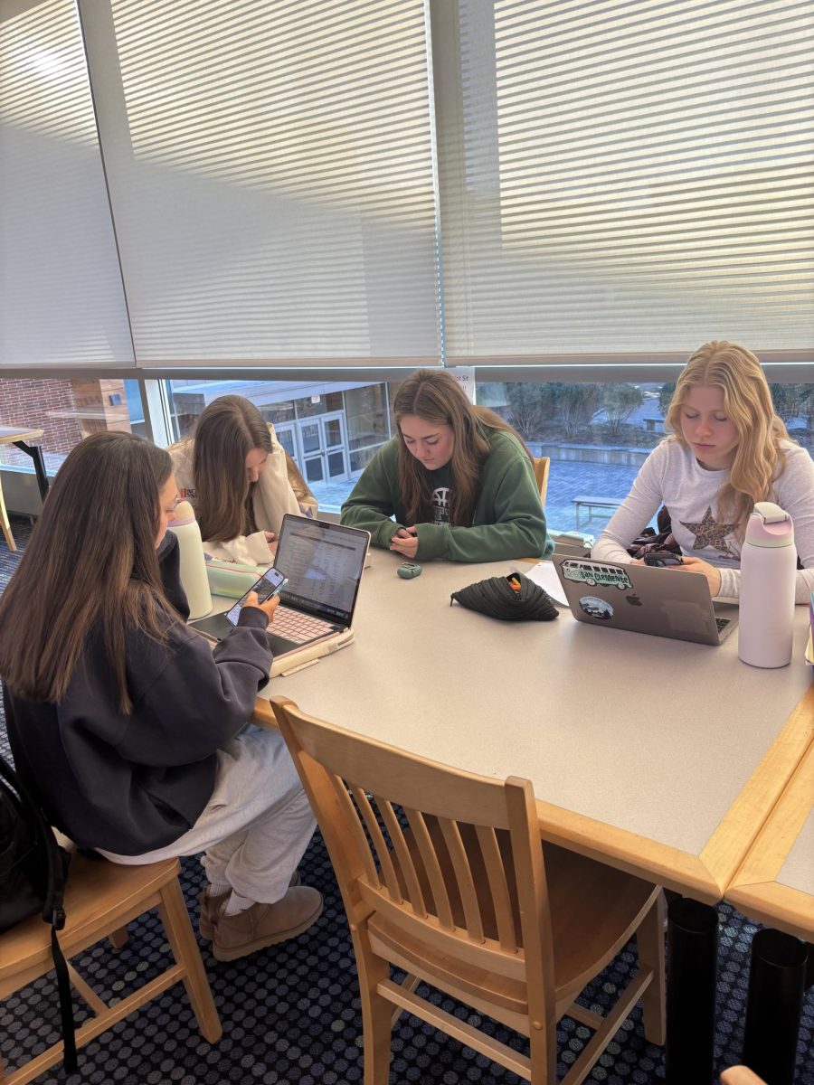 Sutton High students scrolling through social media, probably comparing themselves to the entire world.