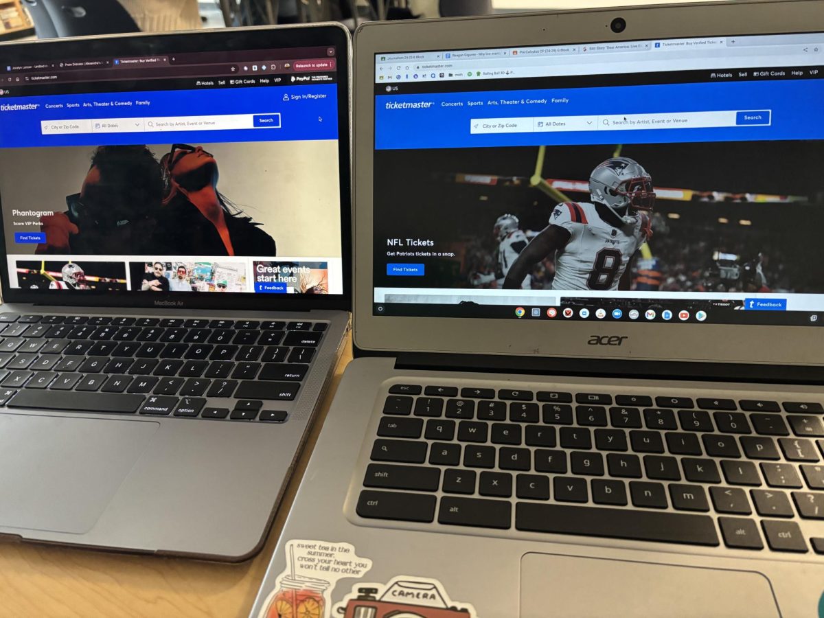 Two students on the Ticketmaster website ready to get in the queue for tickets. 