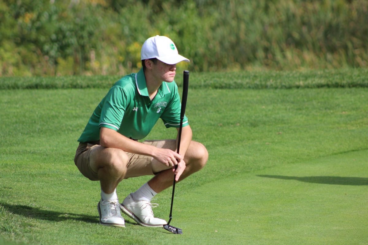 Collin O'Rourke lines up a putt in a recent match