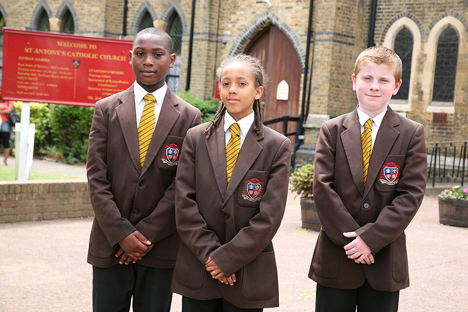 School uniforms can be as fancy as these or as simple as matching polo shirts and khakis.