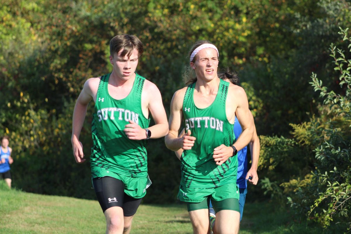Junior Liam Kane and Senior Abraham Auciello helped lead the boys to victory yesterday.