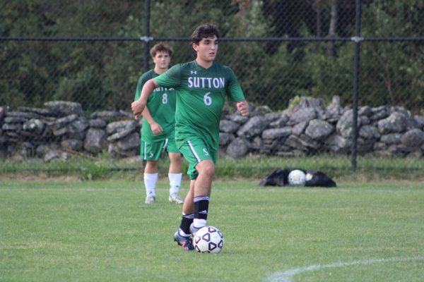 William moves the ball up the field in a recent home game.