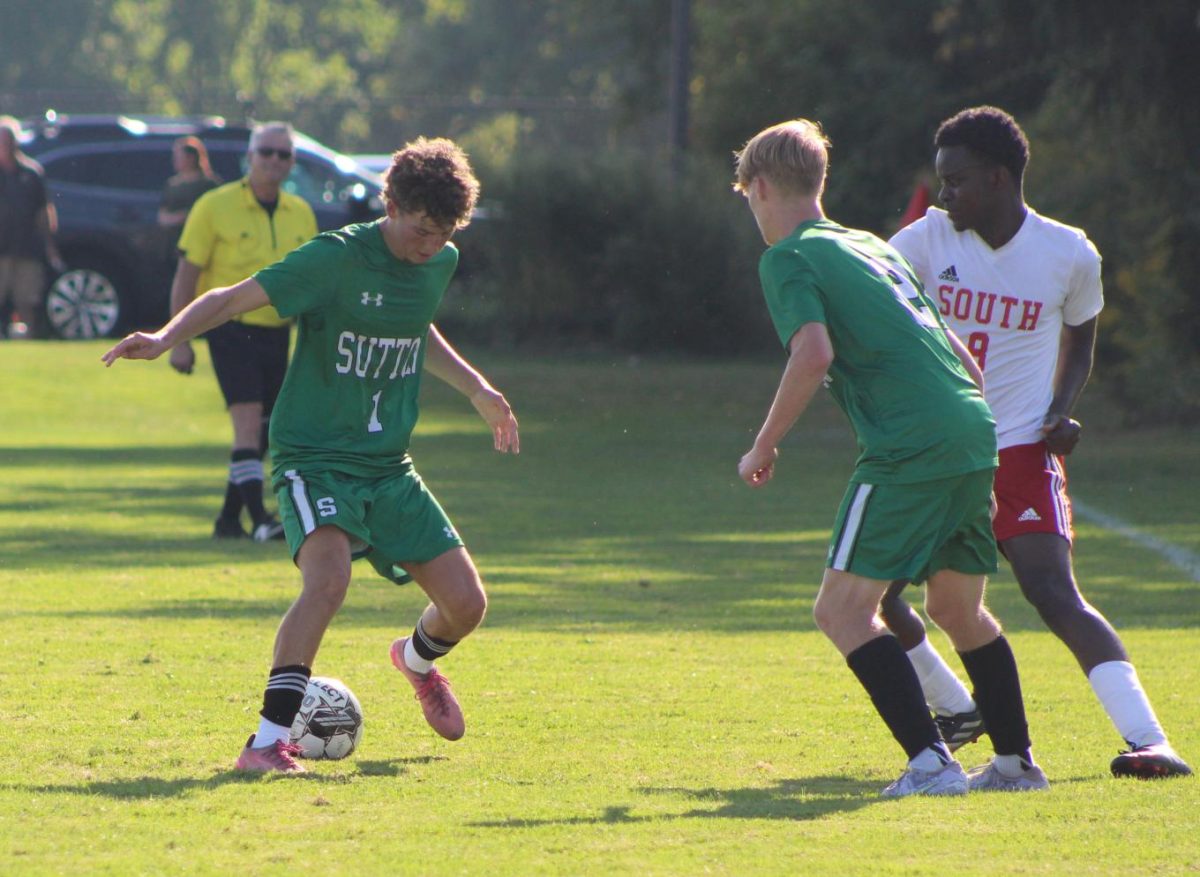 Brady Pitts uses his dribbling skills to help him elude a defender. 