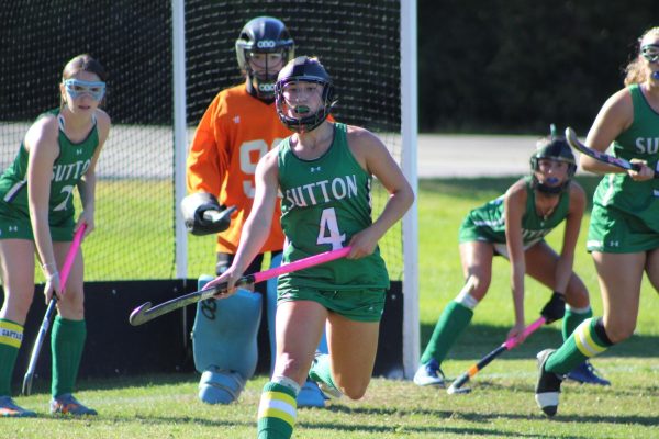 Leah leads the defense in keeping the opponent out of the circle. 