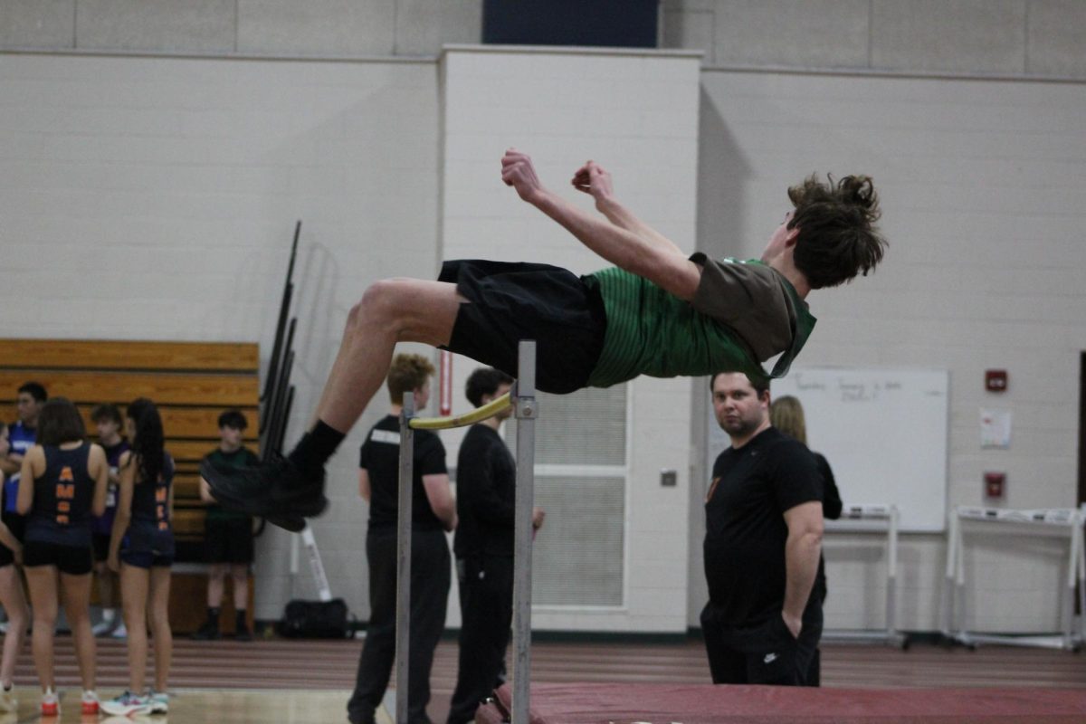 A high jumper jumps a good height at a recent meet the Sammies and Suzies competed at.
