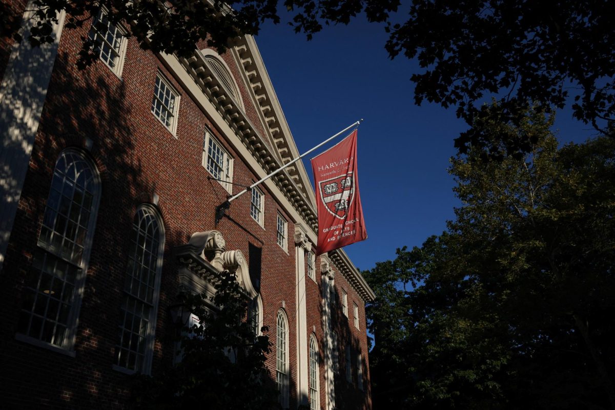 A flag hangs on campus at Harvard University in Cambridge, Massachusetts, U.S., September 4, 2025. REUTERS/Shannon Stapleton
