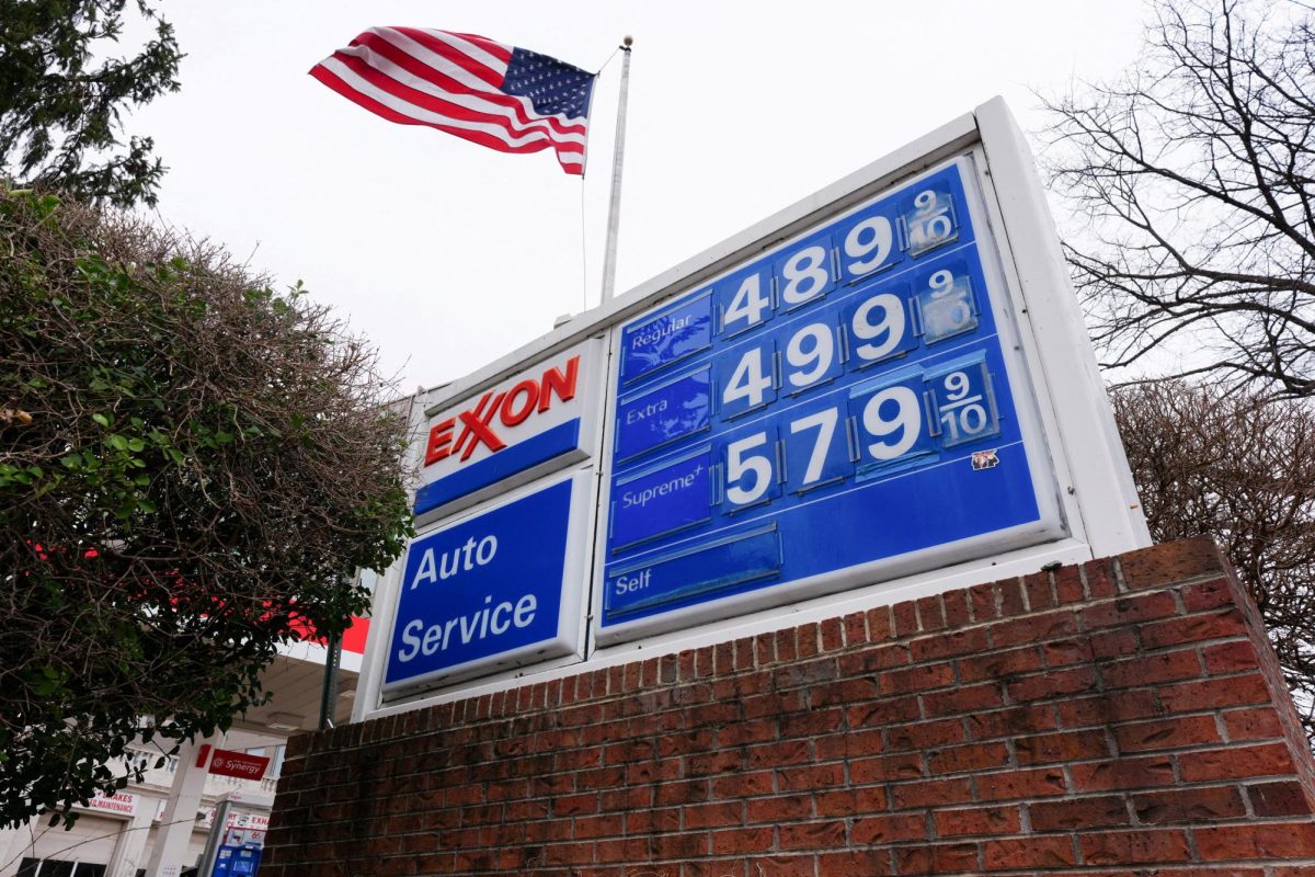 A board displays gas prices amid the ongoing conflict with US-Israeli conflict with Iran, in Washington D.C., U.S., March 15, 2026. REUTERS/Aaron Schwartz